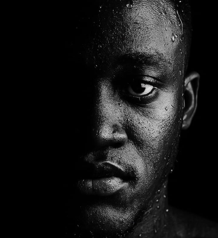 Black-and-white close-up portrait of Bernard Sarfo Twumasi